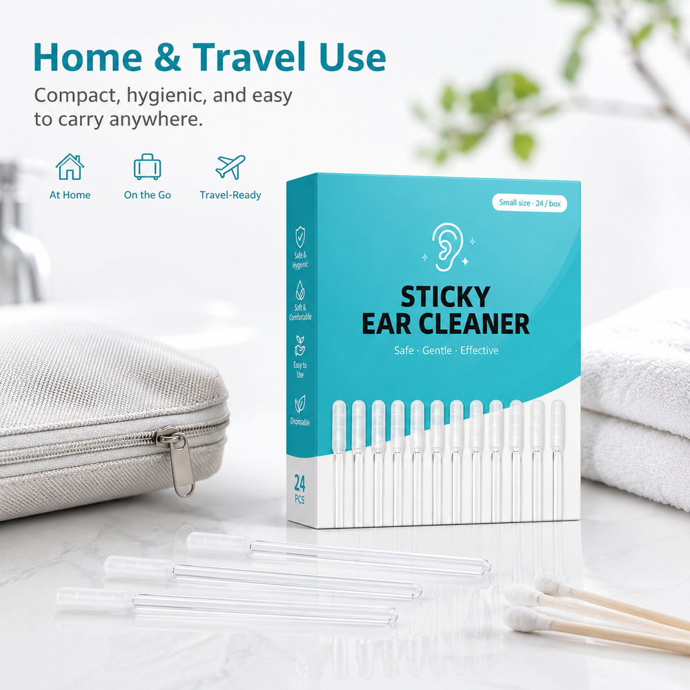 Sticky ear cleaner box and sticks arranged beside a travel bag